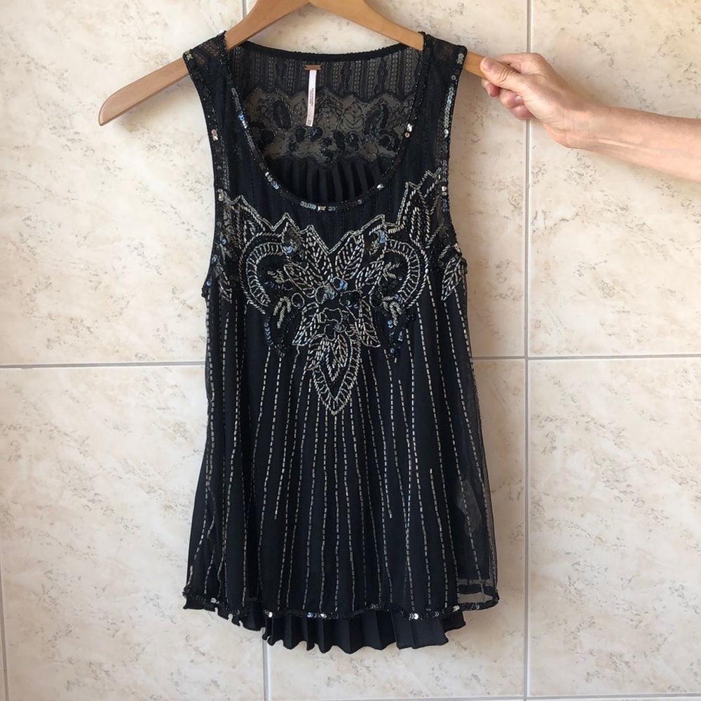 Free People black beaded blouse.
